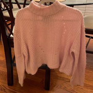 Pink turtleneck crop sweater
